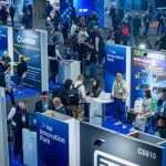 Visitors and exhibitors networking at the Innovation Park startup area during Integrated Systems Europe (ISE)
