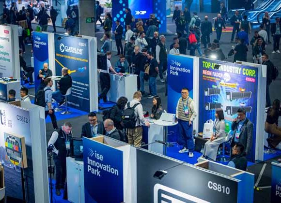 Visitors and exhibitors networking at the Innovation Park startup area during Integrated Systems Europe (ISE)