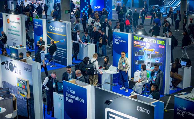 Visitors and exhibitors networking at the Innovation Park startup area during Integrated Systems Europe (ISE)