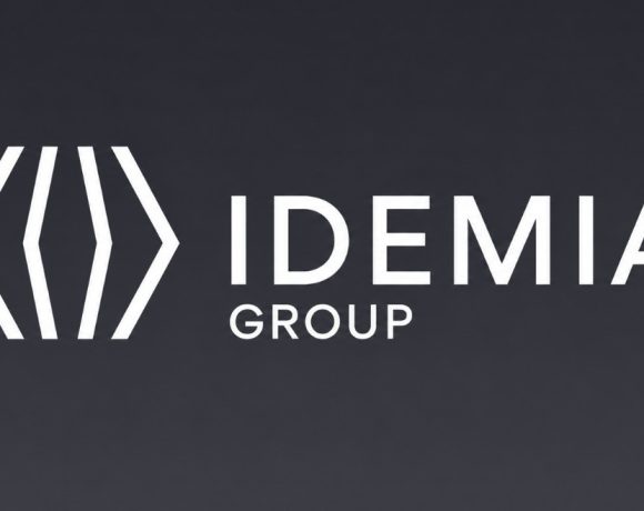 IDEMIA Group logo, provider of secure IoT connectivity for Spain's V-16 emergency beacon program.