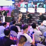 Young cybersecurity specialists speaking on the Dark Stage at GISEC Global 2026