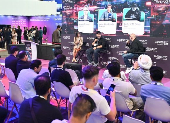 Young cybersecurity specialists speaking on the Dark Stage at GISEC Global 2026