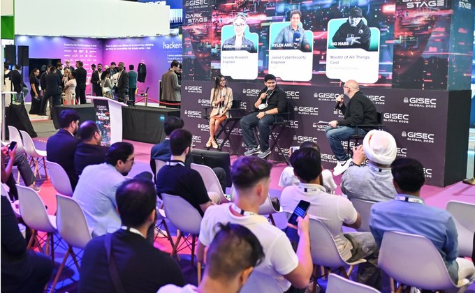 Young cybersecurity specialists speaking on the Dark Stage at GISEC Global 2026