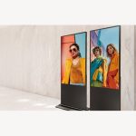 Hikvision and Product.me digital signage displays in a modern fashion retail store